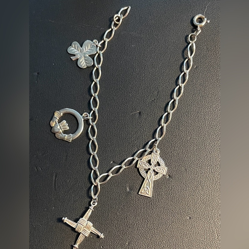 7” Vintage 925 Silver Charm Bracelet with 4 charms 2 stamped Made In Ireland.